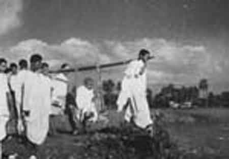 Gandhiji going from Kazirkhil, 17th November, 1946. Gandhiji in an improvised palanquin during a few days indisposition.jpg